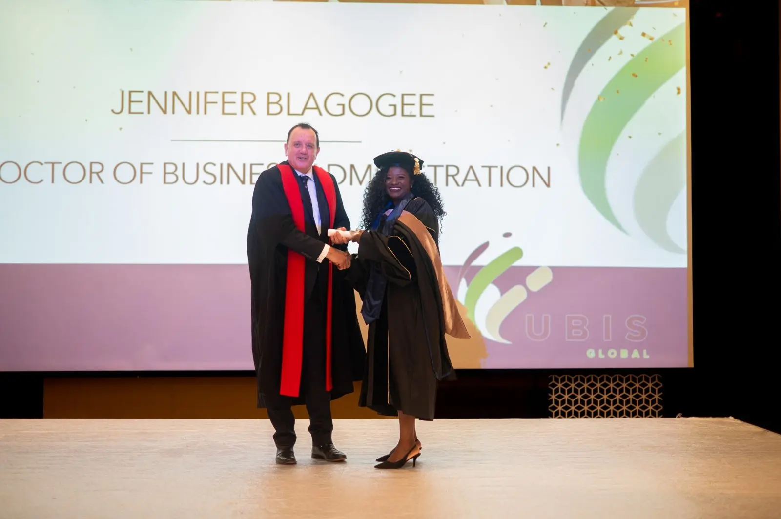 UBIS graduates celebrating at the graduation ceremony