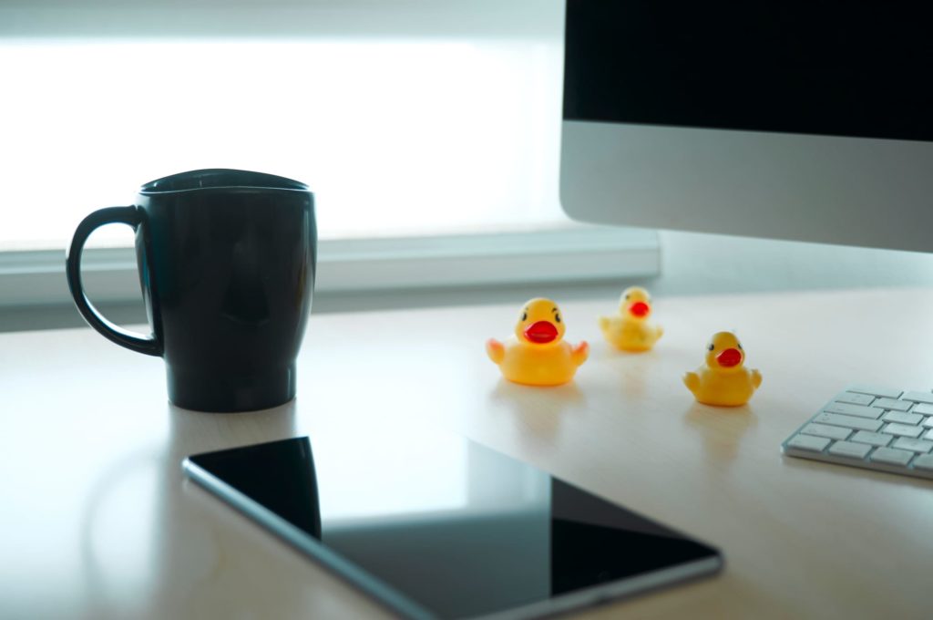 rubber ducks on desk